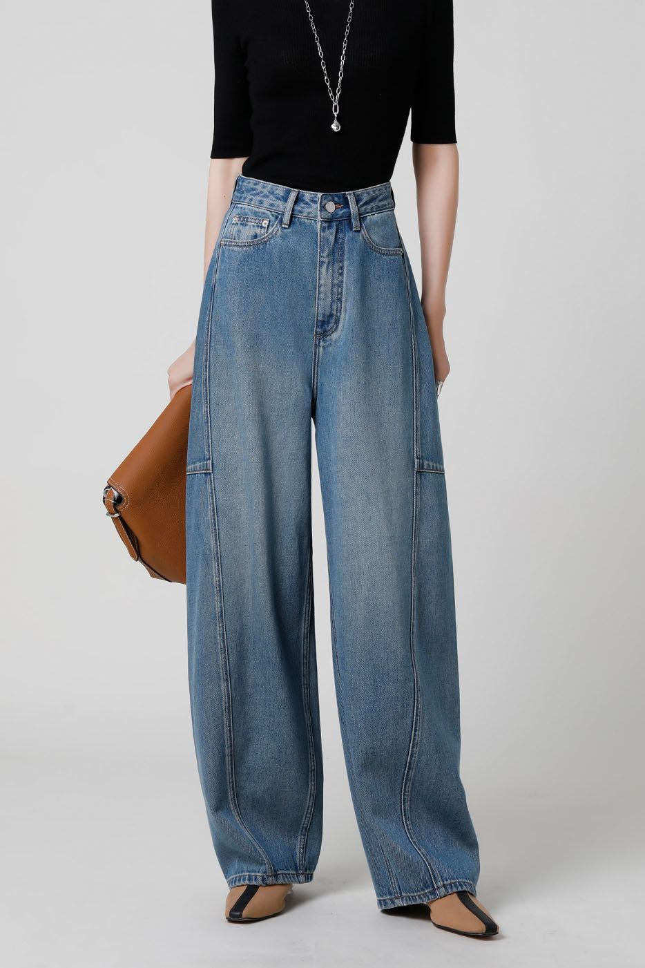Jeans ad arco a vita alta firmati 