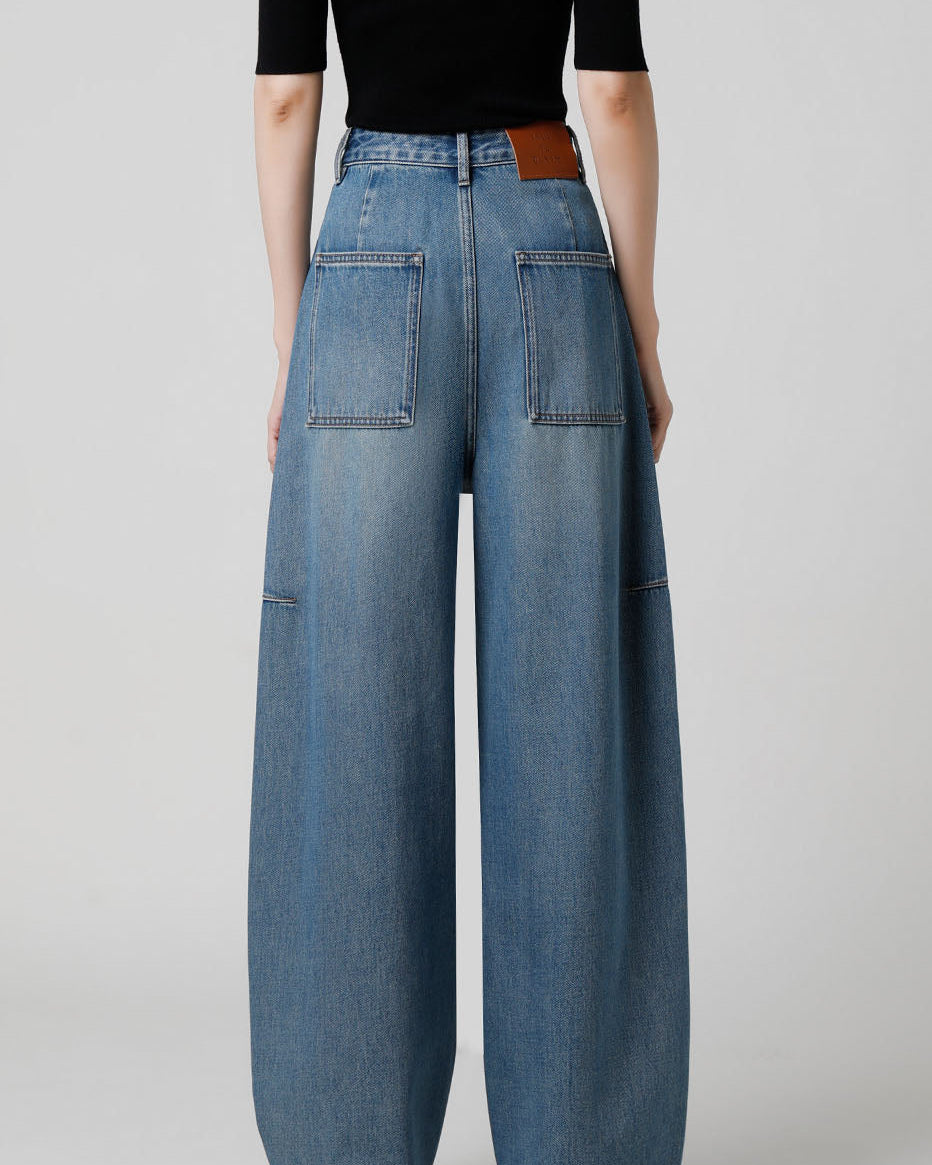 Jeans ad arco a vita alta firmati 